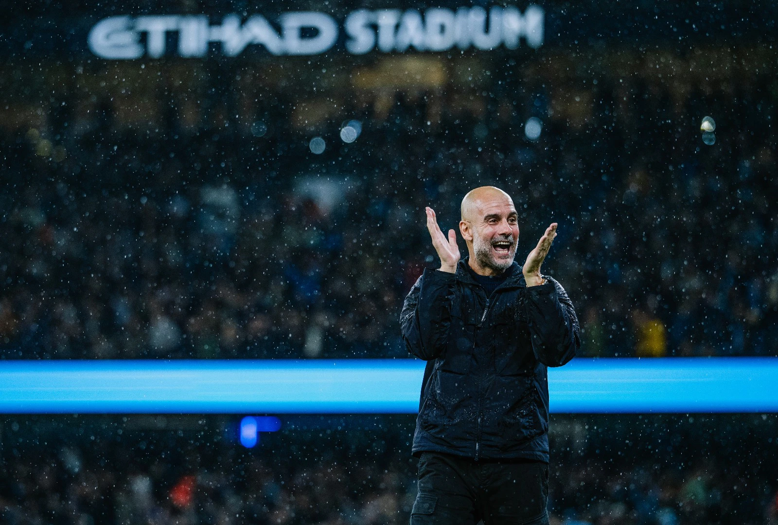 Pep Guradiola enjoying a goal during the Manchester City vs Liverpool match, which is also his 1000th match as a manager