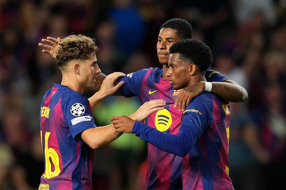 Fermin, Rashford and Balde celebrate Rashford's goal in FC Barcelona vs Olympiacos match | sportzpoint.com